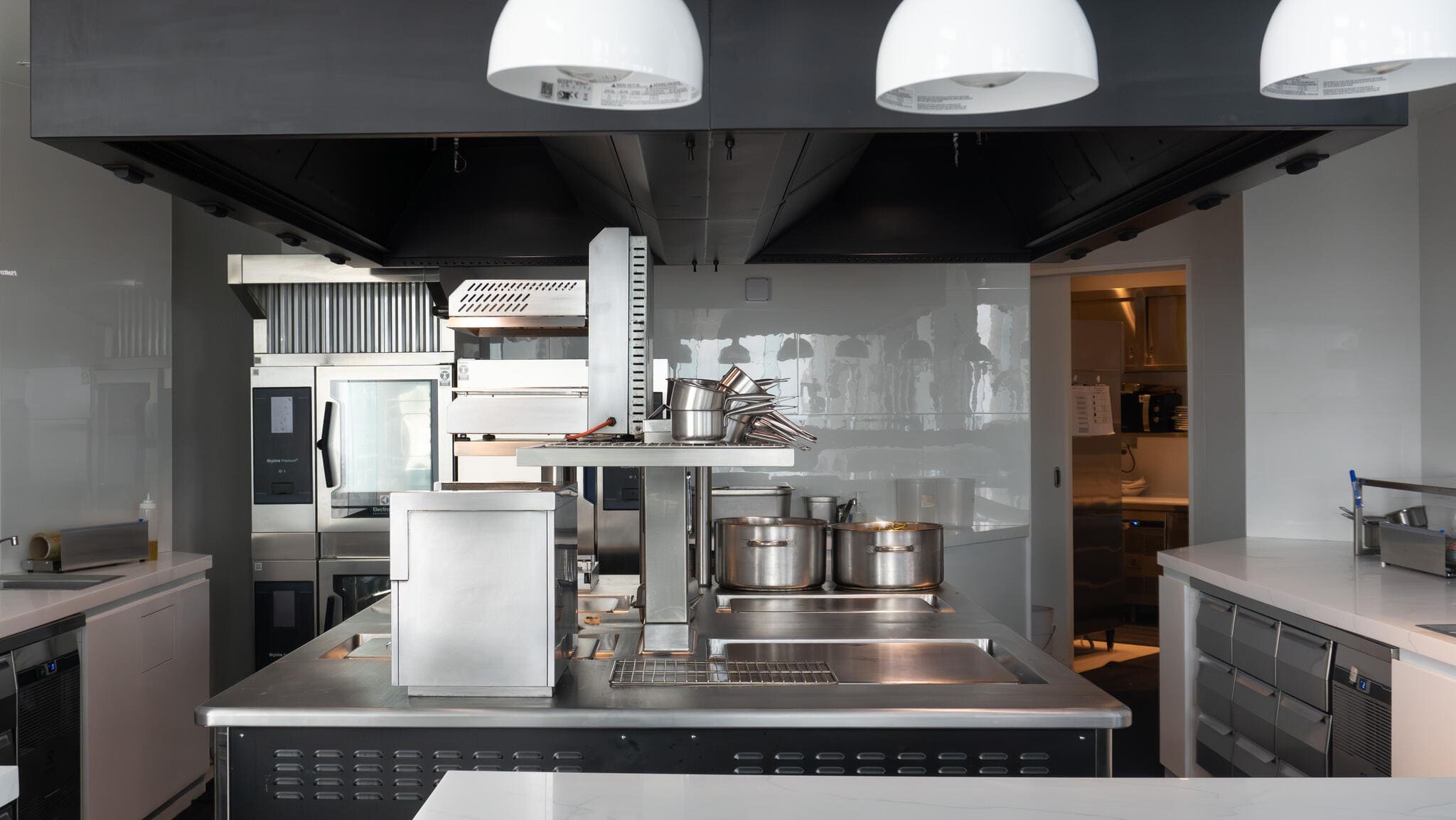 Stainless steel Electrolux Professional kitchen equipment installed at Mezzaluna fine dining restaurant in Bangkok