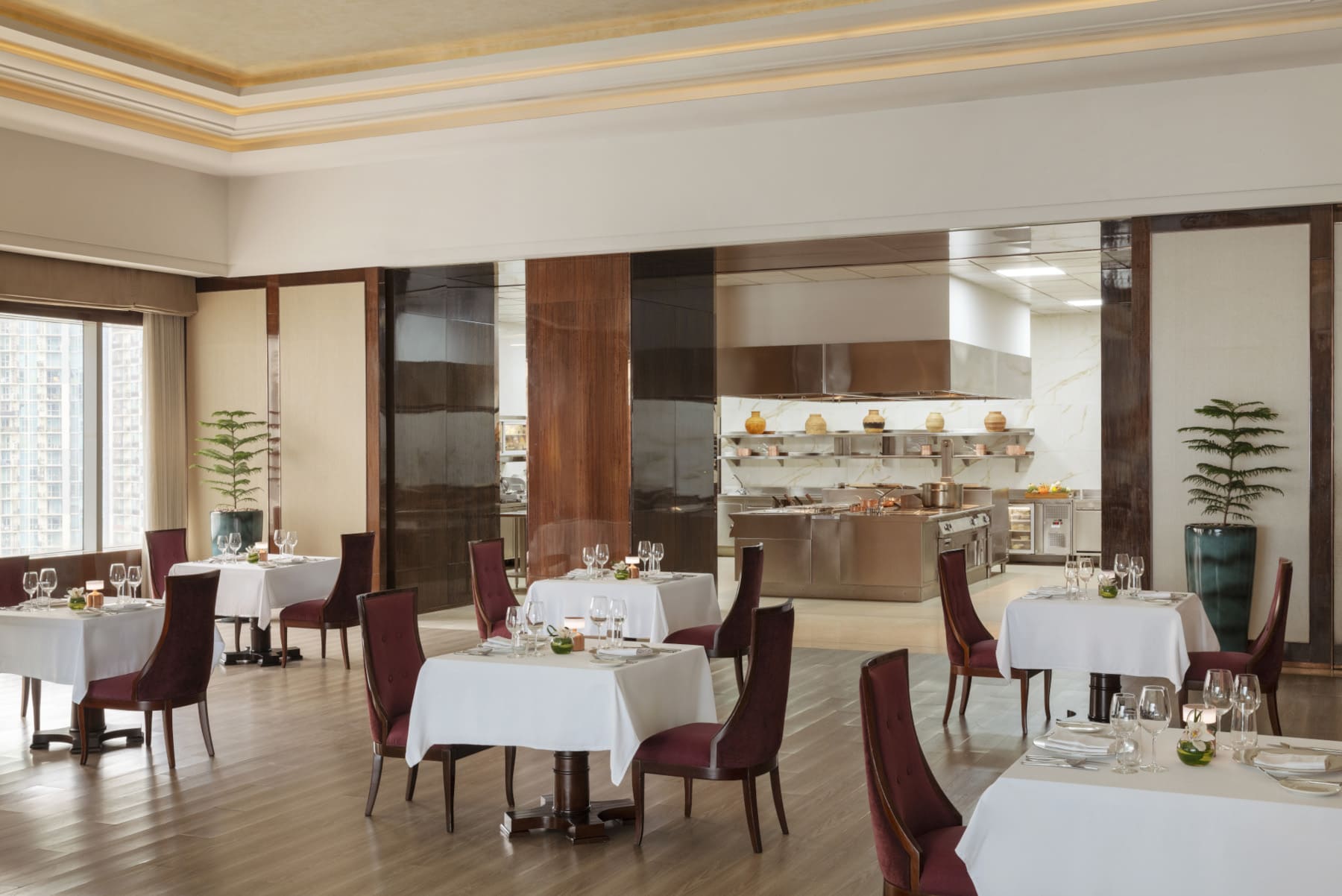 Elegant dining area with set tables at Raffles Hotel Jakarta fine dining restaurant