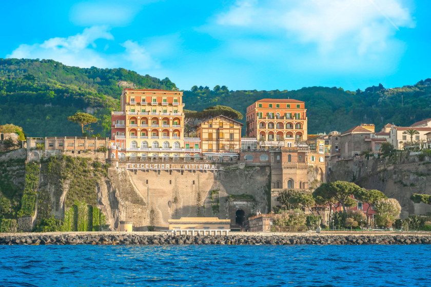 Exterior of Grand Hotel Excelsior Vittoria in Sorrento surrounded by and overlooking the sea